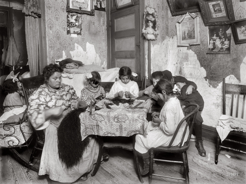 New York. December 1911. “5 p.m. Mrs. Mary Mauro, 309 E. 110th St., 2nd floor. Family works on feathers (sewing them together for use as a hat trimming). Make $2.25 a week. In vacation two or three times as much. Victoria, 8 yrs. Angelina 10 yrs. (a neighbor). Frorandi 10 yrs. Maggie 11 yrs. All work except two boys against wall. Father is street cleaner and has steady job. Girls work until 7 or 8 p.m. Once Maggie worked until 10 p.m.”